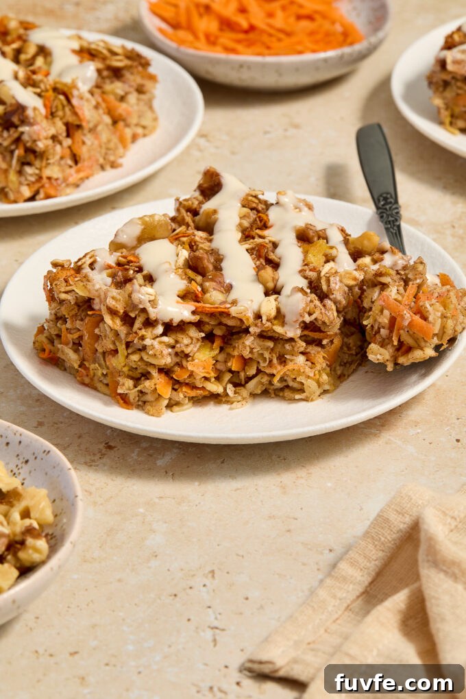 Baked carrot oats with rolled oats on a plate.