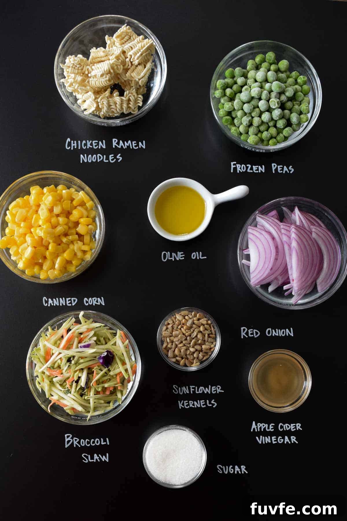 black chalkboard with ingredients for dump and done ramen salad