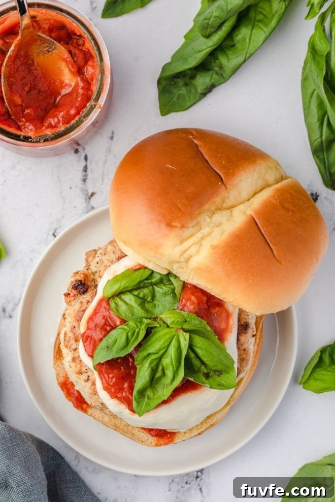 Ground chicken burger with top bun removed