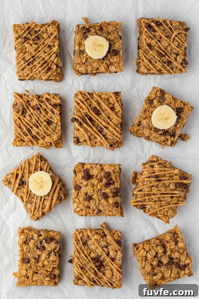 Banana peanut butter oatmeal bars with peanut butter and banana on top