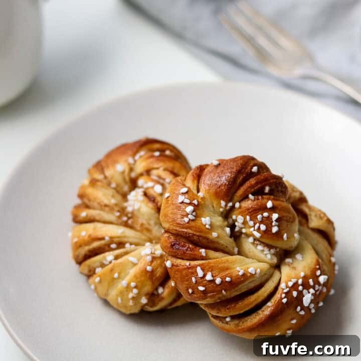 Close up view of a Swedish Cinnamon Bun (Kanelbullar).