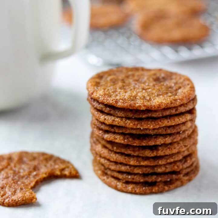 A close up of a stack of Swedish Ginger Cookies (Pepparkakor).