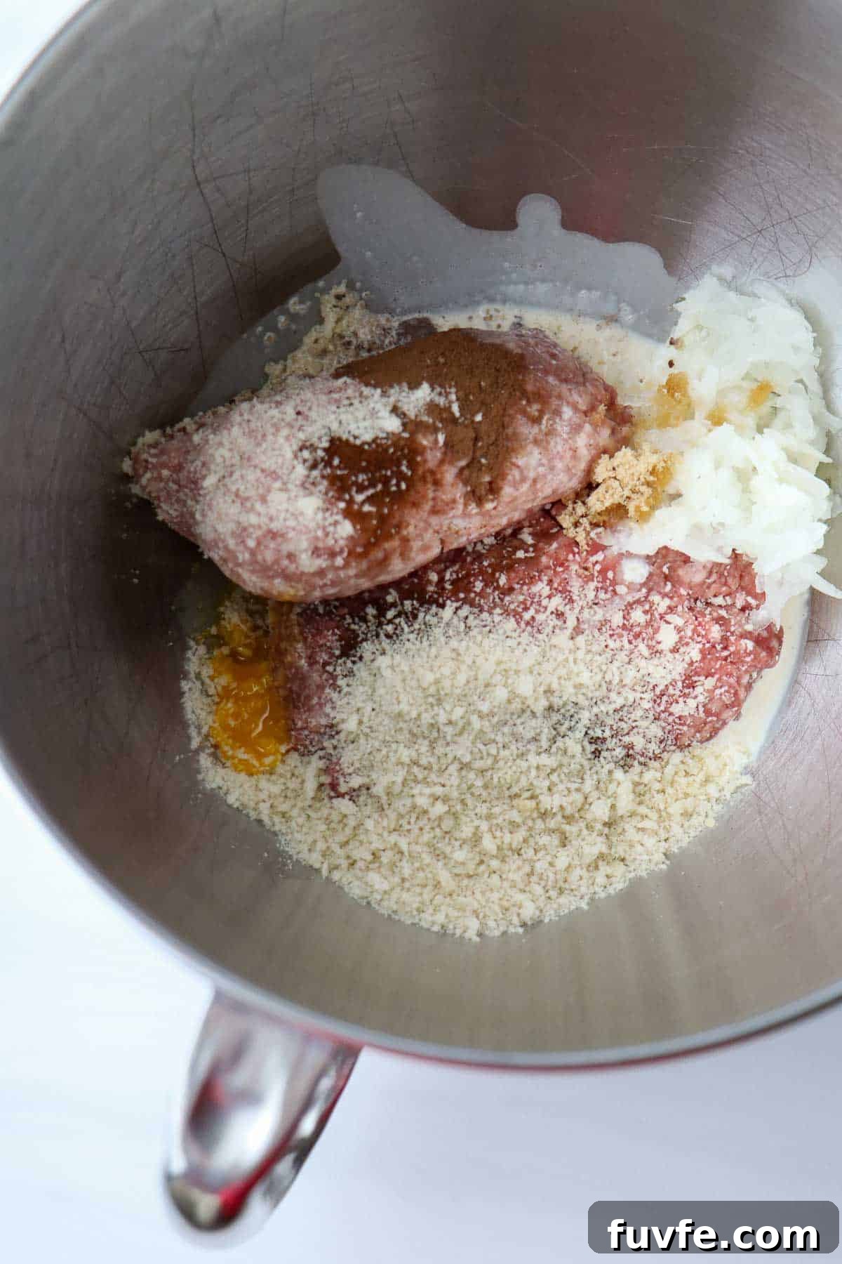 Swedish Meatballs with Classic Creamy Gravy (Köttbullar) 7 Ingredients for Swedish Meatballs in a mixer bowl.