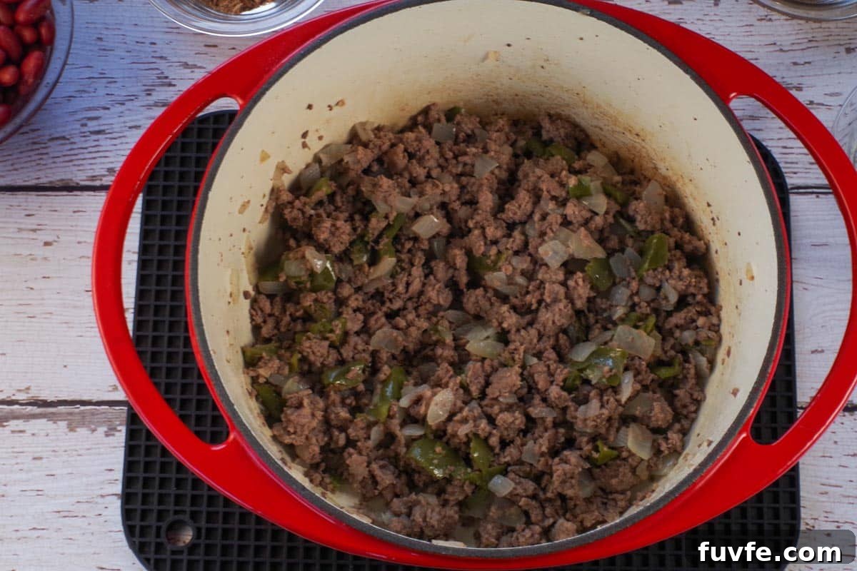 Award-Winning Shredded Carrot Chowder Recipe 5 ground beef and pork with onions and green peppers browned in orange dutch oven