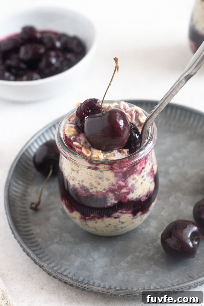 Overnight oats with cherries in a jar.