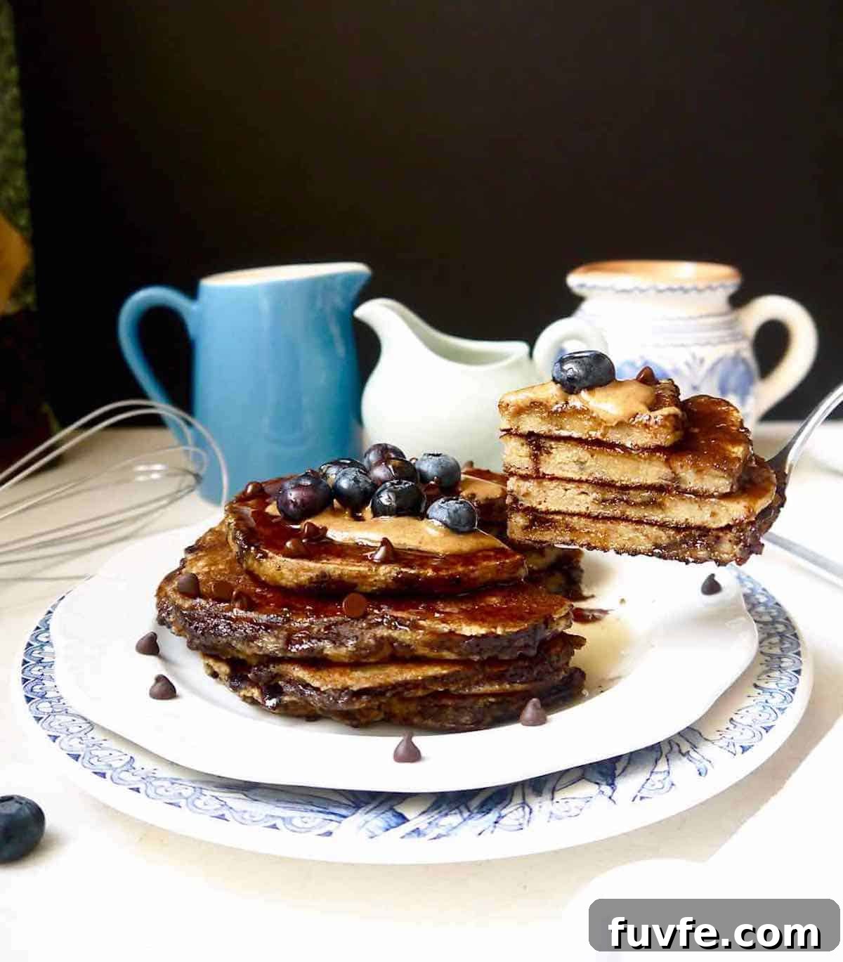 Gluten-free banana pancakes on a fork.