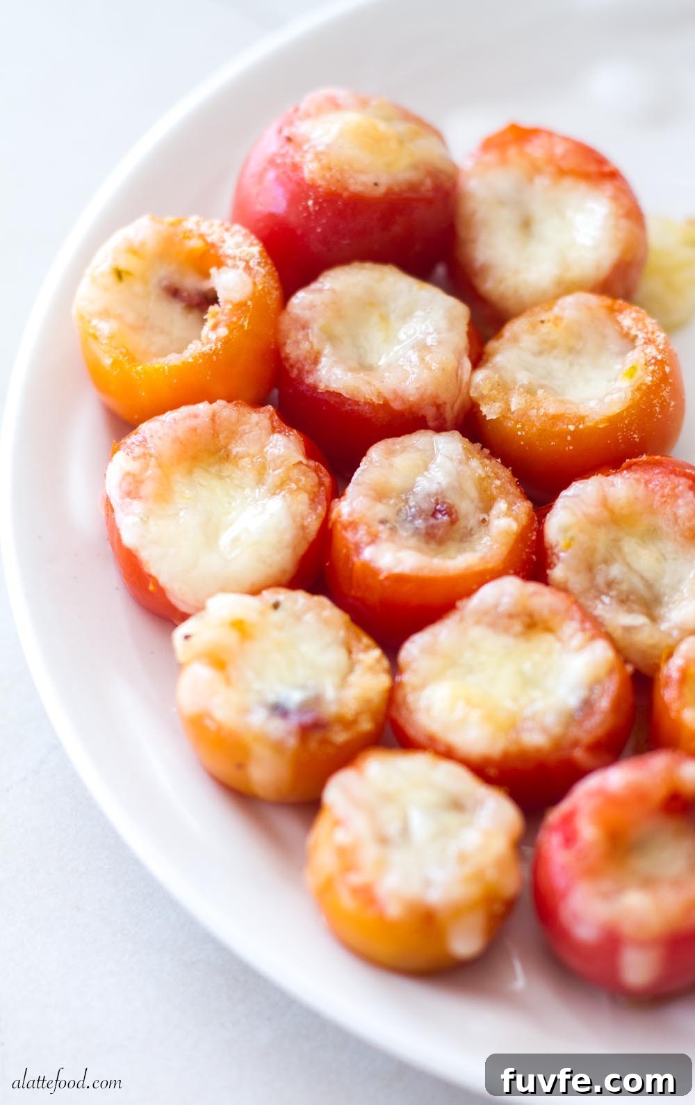 stuffed tomatoes on a white plate