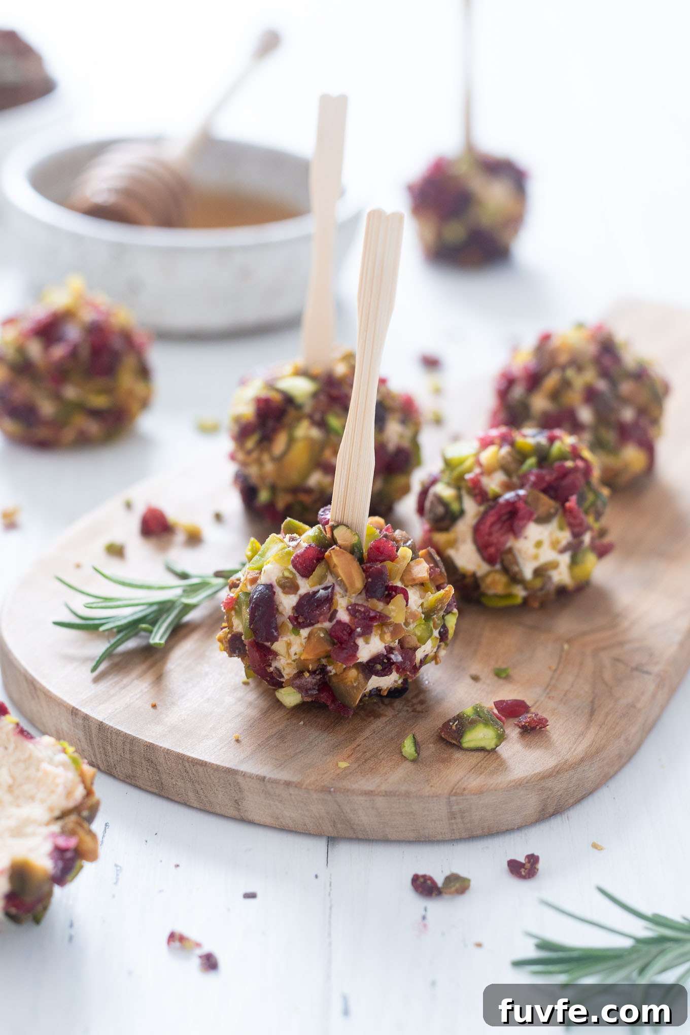 Mini goat cheese balls with wooden picks
