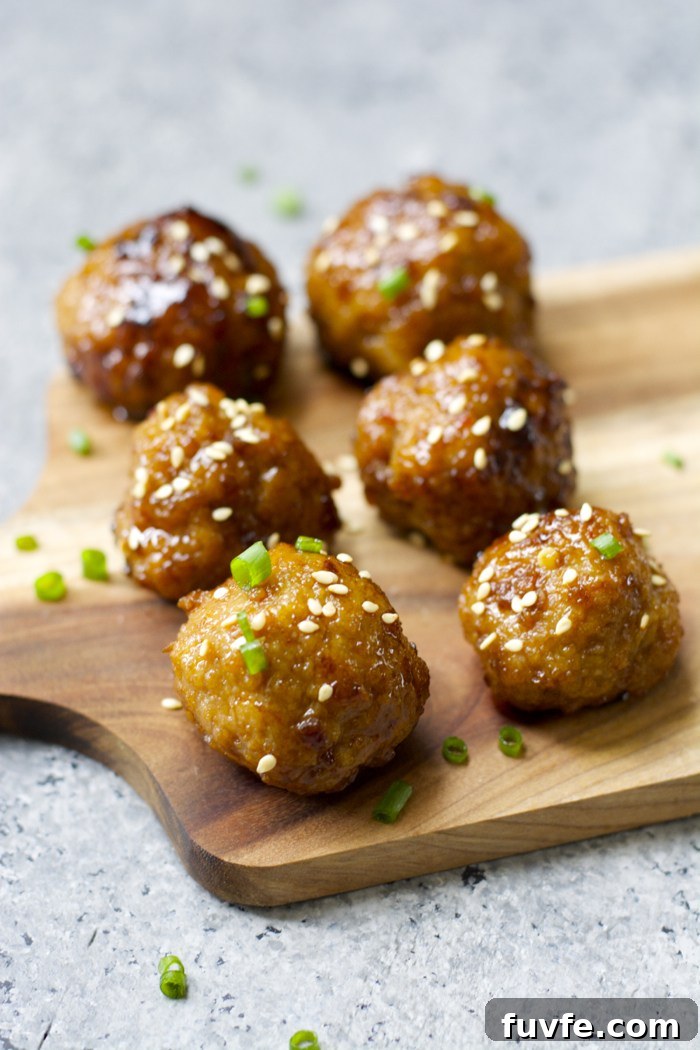 Asian meatballs on a cutting board
