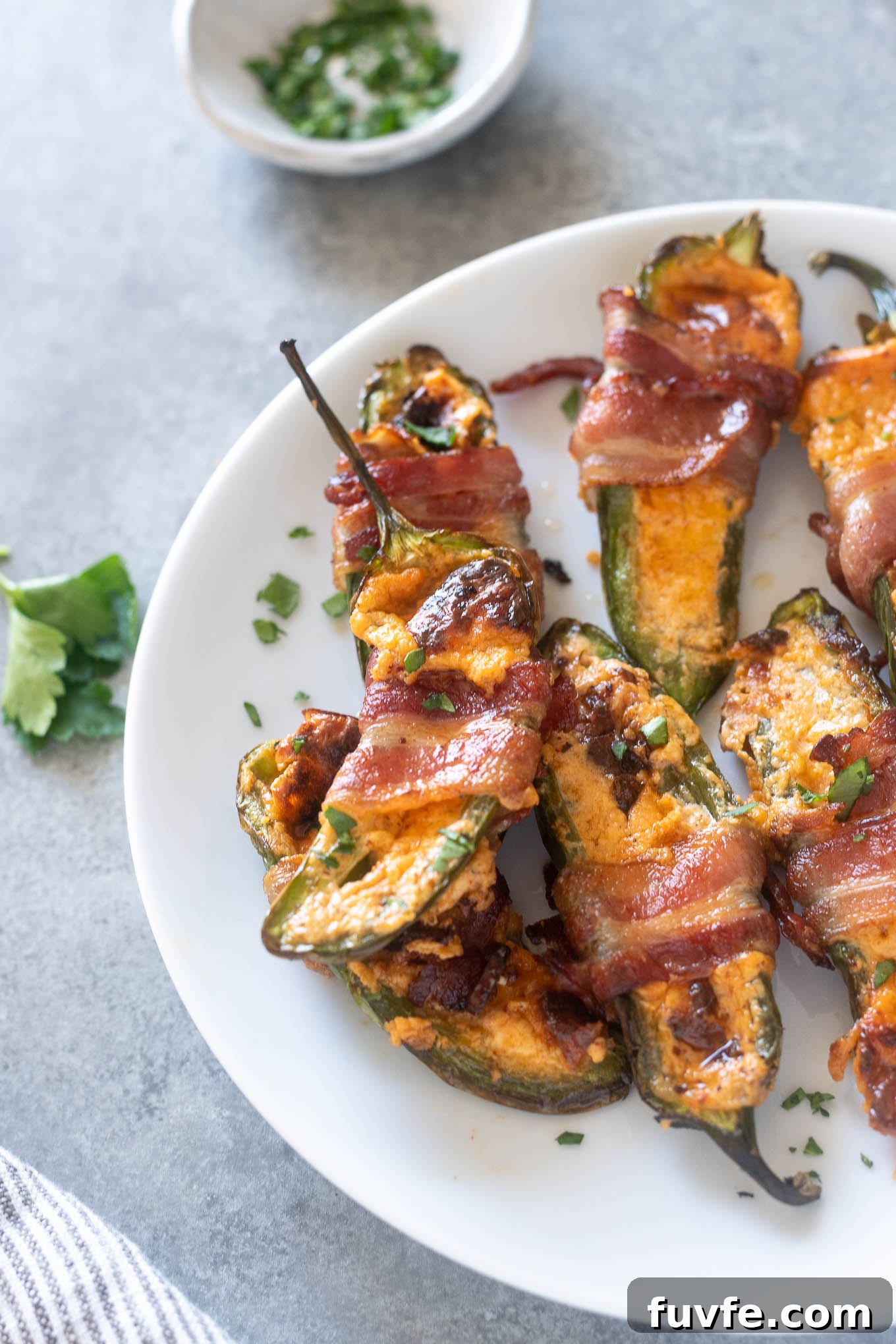 Air fryer jalapeño poppers wrapped in bacon