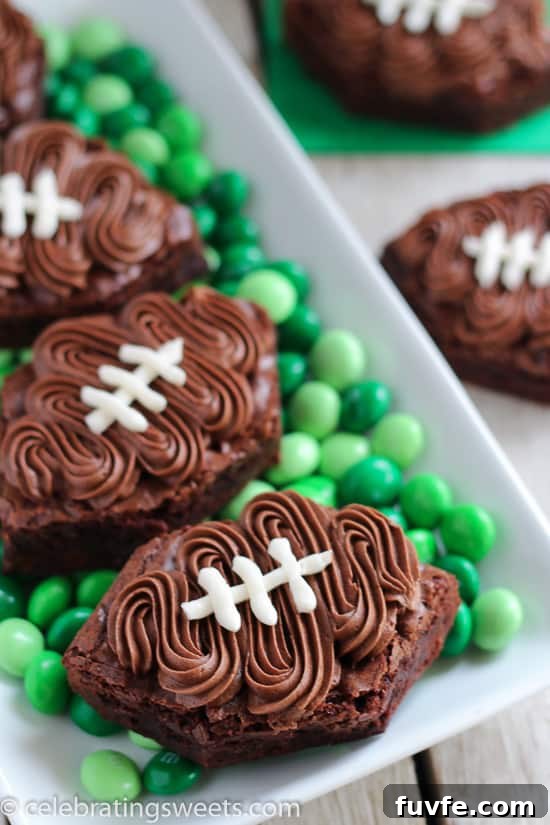 Frosted football brownies on a platter