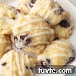 Lemon blueberry cookies on white plate.