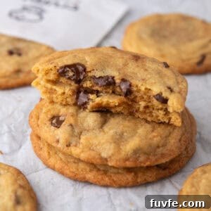 Close-up of Crumbl Martha Stewart cookie stack with gooey melted chocolate center.