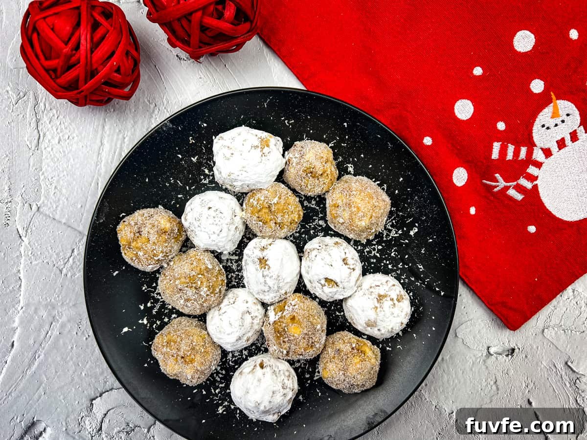 29 Christmas Baking Ideas for Home Bakers Who Love a Busy Oven 12 Bourbon balls with white chocolate and powdered sugar