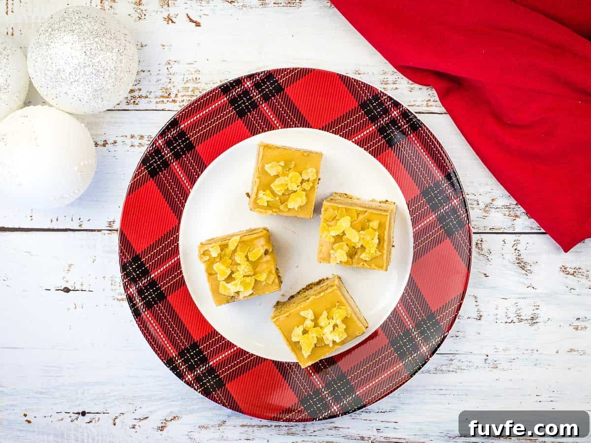 29 Christmas Baking Ideas for Home Bakers Who Love a Busy Oven 5 A plate with four squares of triple ginger cake bars on it.