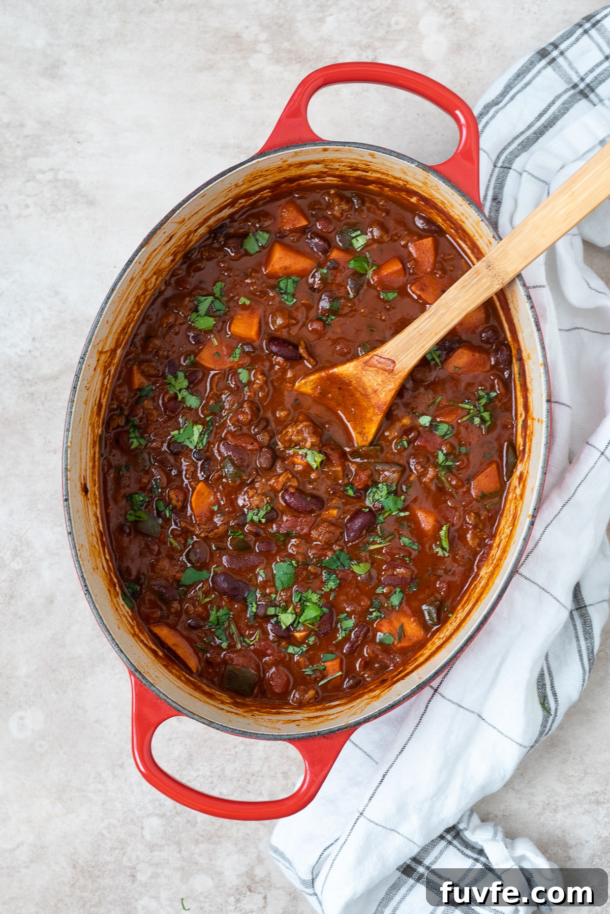 Smoky Spicy Chorizo Chili with Beans 6 Chorizo chili with sweet potato in a Dutch oven.