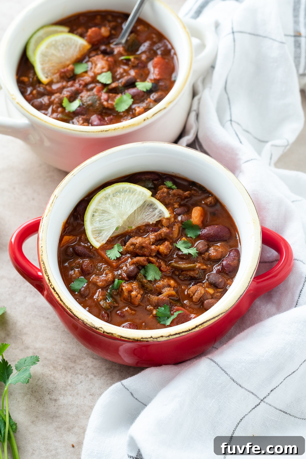 Smoky Spicy Chorizo Chili with Beans 7 Chorizo chili with sweet potato in a bowl.