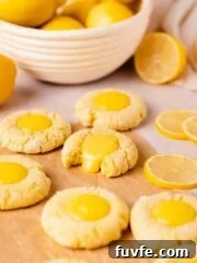 crinkle cookies with lemon curd filling and one bitten cookie