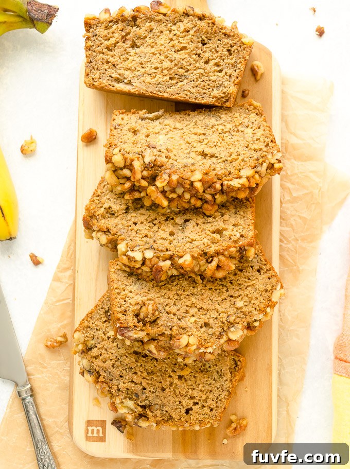 One-Bowl Banana Nut Bread Recipe (No Mixer) 3 Loaf of banana nut bread sliced