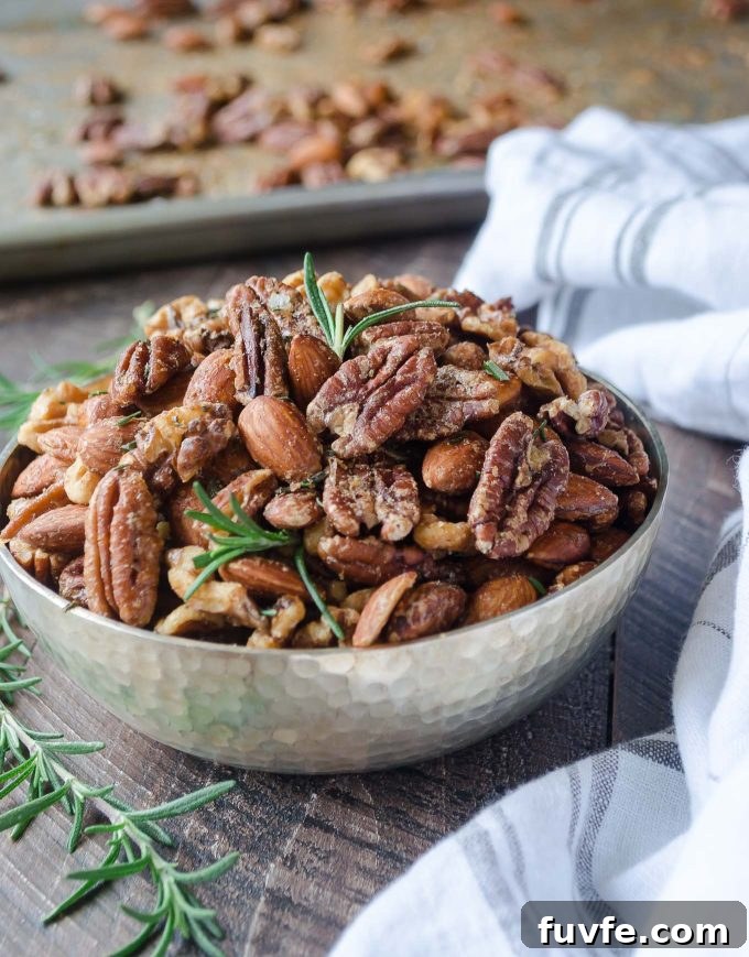 Roasted almonds, walnuts and pecans in a bowl