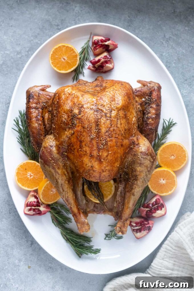 Dry-Brined Roast Turkey Recipe for Juicy, Crispy Skin 3 Roast turkey with dry brine on a serving platter.