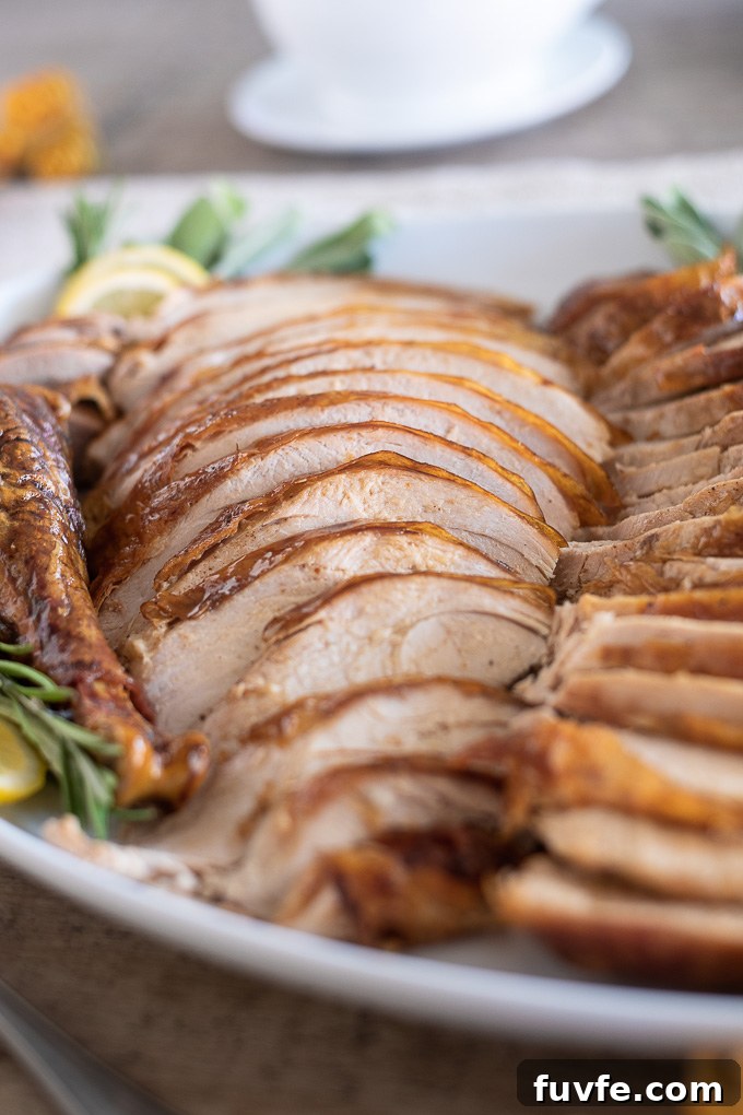 Dry-Brined Roast Turkey Recipe for Juicy, Crispy Skin 6 Roast turkey recipe sliced on a platter