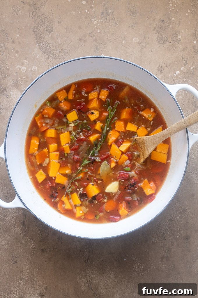 Comforting Autumn Vegetable Soup with Roasted Roots 5 Fall vegetable soup in a Dutch oven before simmering.