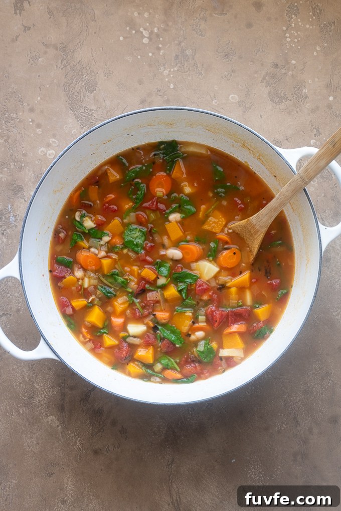 Comforting Autumn Vegetable Soup with Roasted Roots 7 Fall vegetable soup with kale added.