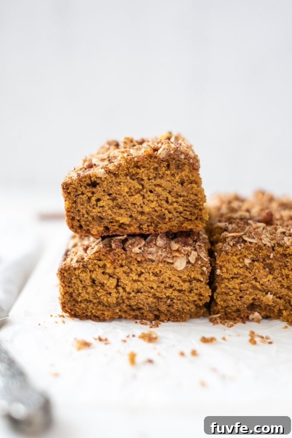 Pumpkin Coffee Cake Recipe with Oat Pecan Streusel 7 pumpkin coffee cake stacked up on a marble board