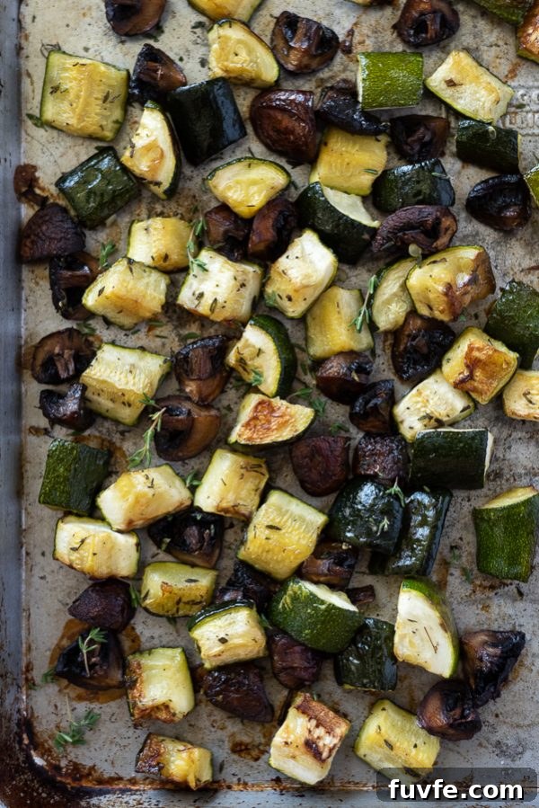 Garlic-Roasted Zucchini and Mushrooms Recipe 3 Sheet pan with caramelized roasted zucchini and mushrooms