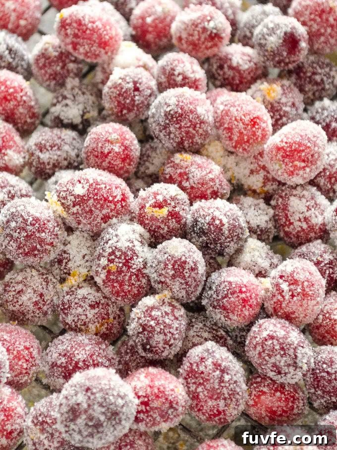 Sparkling Orange Sugared Cranberries Recipe 6 Sparkling Sugared Cranberries piled on a wire rack