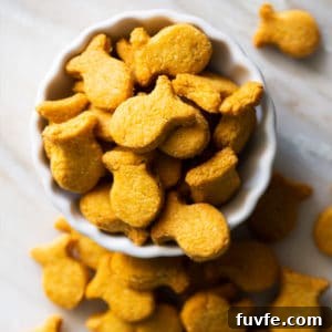 Homemade keto goldfish crackers in a white serving bowl