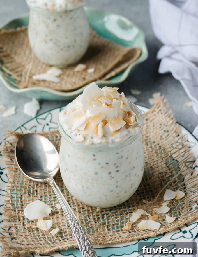 Coconut overnight oats with coconut flakes piled on top.