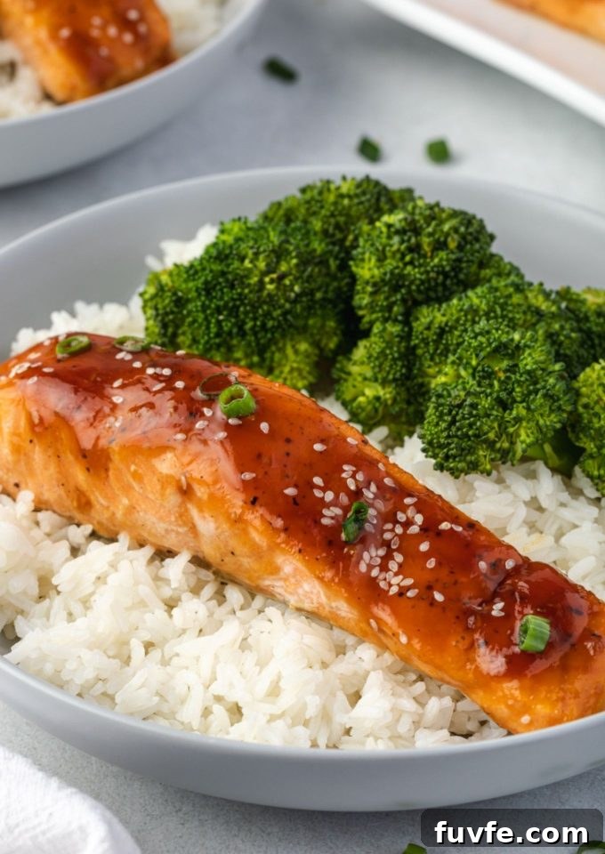 Crispy Oven-Baked Teriyaki Salmon Recipe with Sticky Glaze 2 Teriyaki Salmon on a bed of rice
