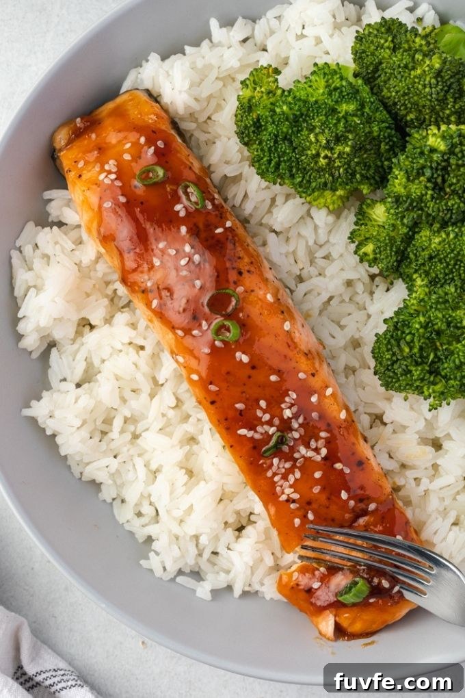 Crispy Oven-Baked Teriyaki Salmon Recipe with Sticky Glaze 3 Baked teriyaki salmon with rice and broccoli