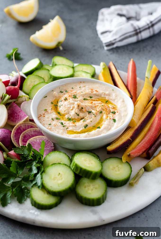 Platter of white bean hummus and fresh veggies