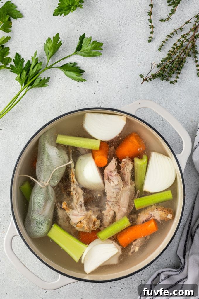 Chicken stock ingredients in a pot