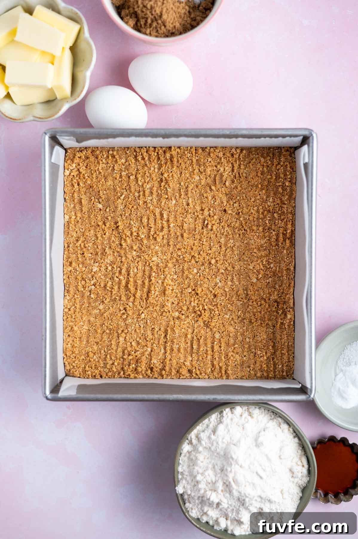 Decadent Banoffee Cake Recipe with Caramelized Banana Layers 6 graham cracker crust in a baking pan