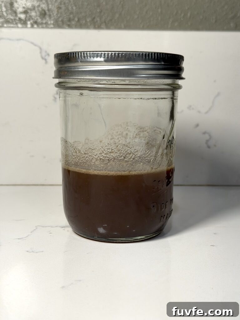 Banana Bread Latte Syrup Recipe — Homemade Coffee Flavoring 12 a jar of banana bread syrup