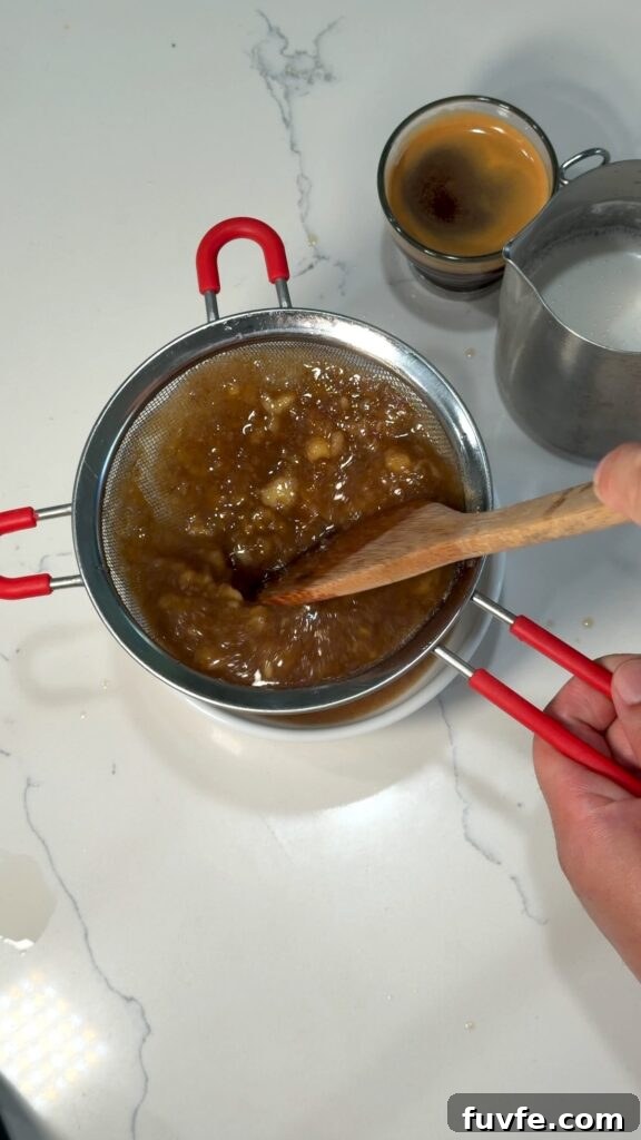 Banana Bread Latte Syrup Recipe — Homemade Coffee Flavoring 9 straining the solution