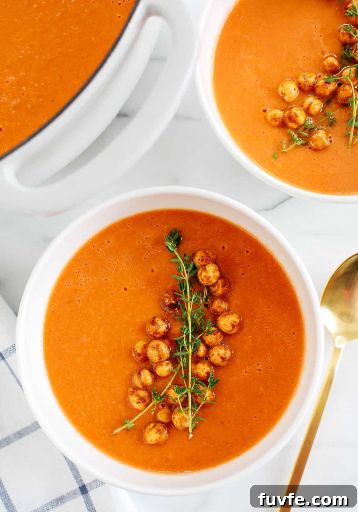 This Creamy Tomato Hummus Detox Soup is the perfect remedy for cold and flu season that is filled with tons of antioxidants and immune-boosting ingredients to keep you healthy all season long!