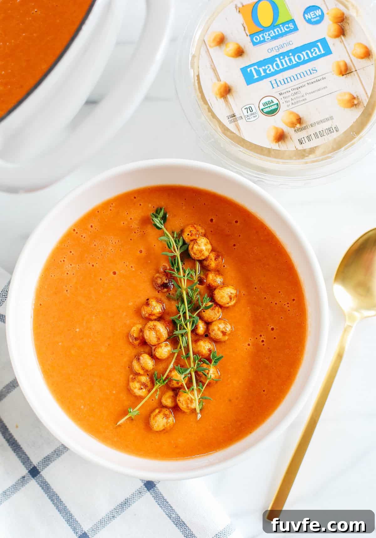 This Creamy Tomato Hummus Detox Soup is the perfect remedy for cold and flu season that is filled with tons of antioxidants and immune-boosting ingredients to keep you healthy all season long!