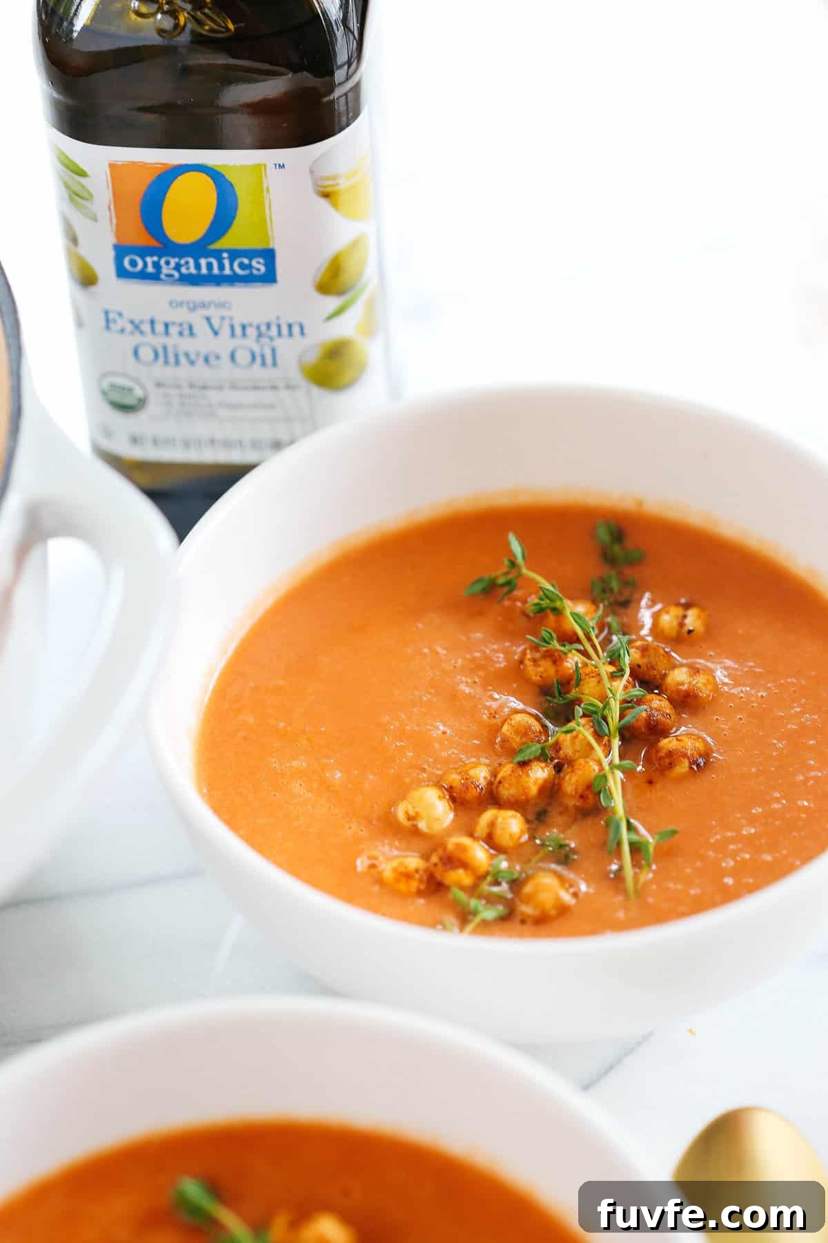 This Creamy Tomato Hummus Detox Soup is the perfect remedy for cold and flu season that is filled with tons of antioxidants and immune-boosting ingredients to keep you healthy all season long!