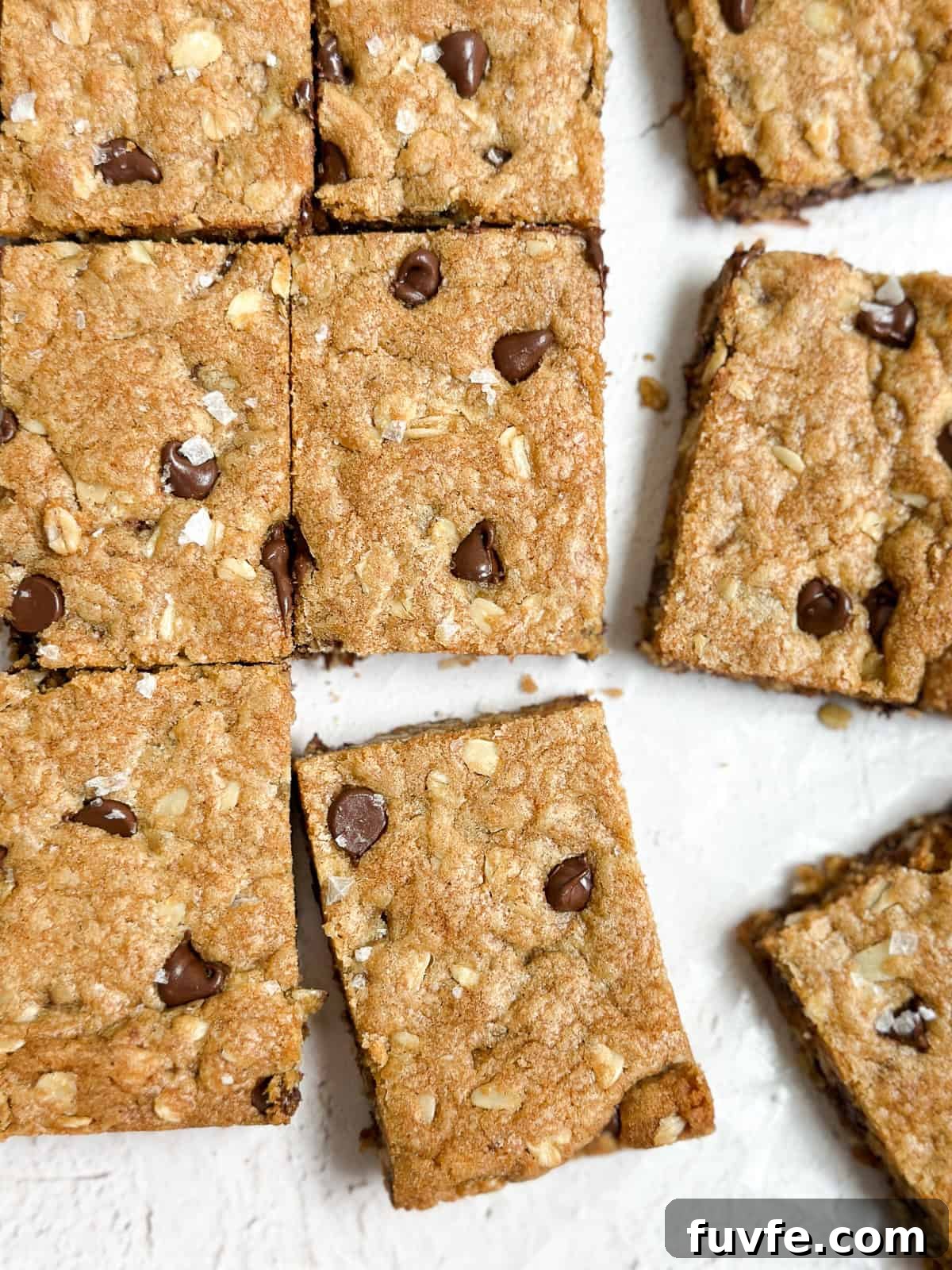 a few of the browned butter oatmeal cookie bars cut into squares.