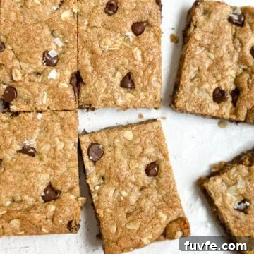 a few of the browned butter oatmeal cookie bars cut into squares.
