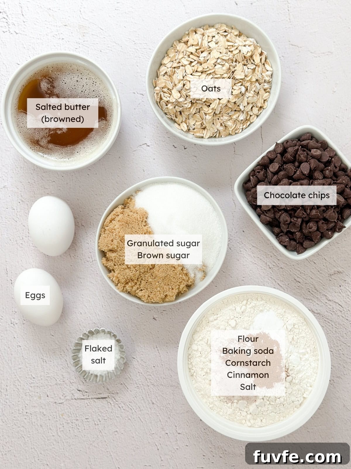 All of the ingredients needed to make brown butter oatmeal cookie bars.
