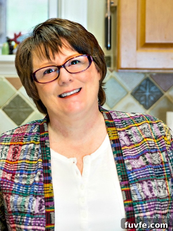 Chicken and Chorizo Enchiladas: From Aztec Roots to Tex‑Mex Favorites 9 Head shot of Jennifer Field.