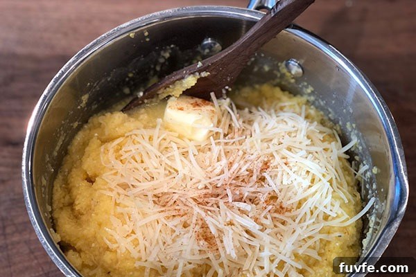 Spicy Sweet Corn Polenta Recipe — Creamy, Savory, Zesty 5 adding butter, cheese, and seasonings to cooked polenta