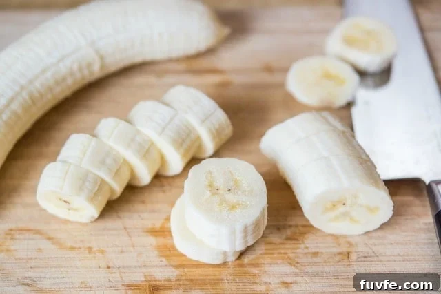 Pan Fried Honey Bananas Recipe Cutting a Banana Into Slices Before Cooking