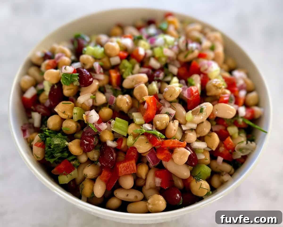Oil-Free Bean Salad with Zesty Vinaigrette 9 The recipe is in a bowl on the table.